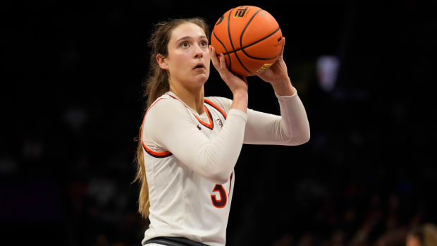 Nov 9, 2023; Charlotte, North Carolina, USA; Virginia Tech Hokies center Elizabeth Kitley (33) takes a foul shot against the Iowa Hawkeyes during the first half at Spectrum Center.